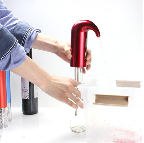 Portable Electric Wine Pourer Smart Wine Decanter Automatic Red Wine Pourer dispensing wine from a bottle.
