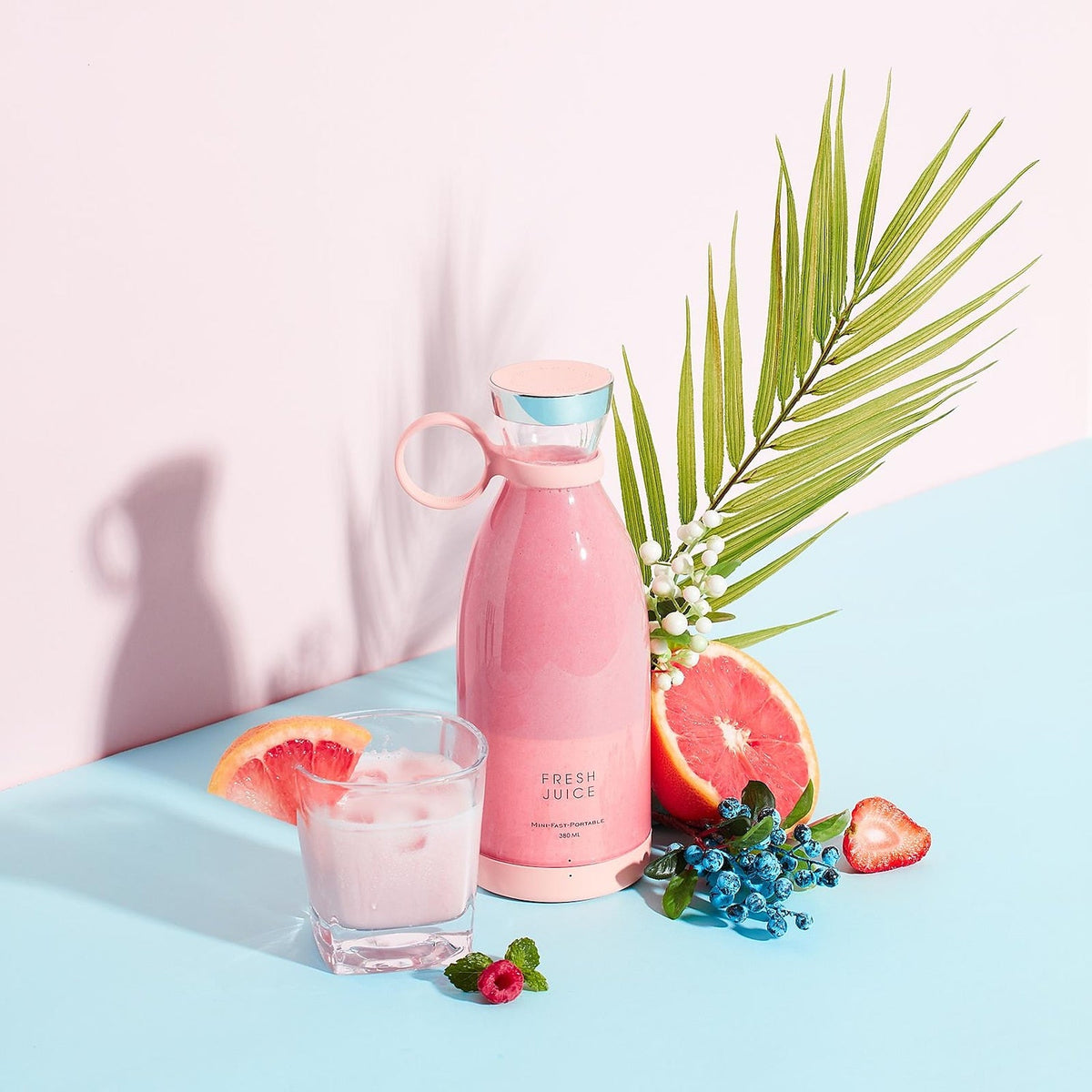 Portable blender bottle for smoothies on the go